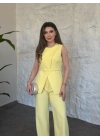 Omuz düğmeli önü üçgen kesim takım Sarı