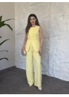 Omuz düğmeli önü üçgen kesim takım Sarı