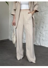 Trenç görünümlü belinden kuşaklı tivil takım krem