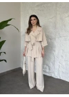 Trenç görünümlü belinden kuşaklı tivil takım krem