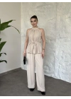 Halter yaka belinden kuşaklı linda takım krem
