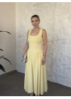Bel drapeli prenses elbise sarı