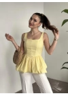 Belden oturtmalı balon etekli tasarim bluz sarı