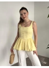 Belden oturtmalı balon etekli tasarim bluz sarı