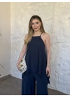Marka model Halter yaka asimetrik kesim tulum lacivert