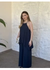 Marka model Halter yaka asimetrik kesim tulum lacivert