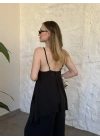 Marka model Halter yaka asimetrik kesim tulum siyah