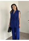 Sıfır kol belden bağlamalı kumaş takım saks mavisi