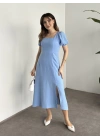 Sırt dekolteli ve yırtmaçlı keten elbise mavi