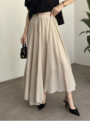 Asimetrik kesim astarlı uzun etek krem