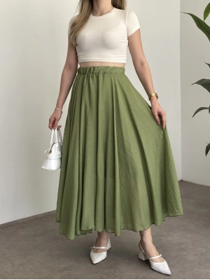 Asimetrik kesim astarlı uzun etek yeşil