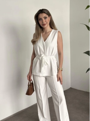 Belinden kuşaklı v yaka dabıl takım bebek mavisi