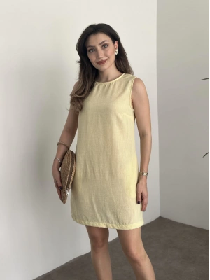 Bisiklet yaka cepli kısa keten elbise sarı