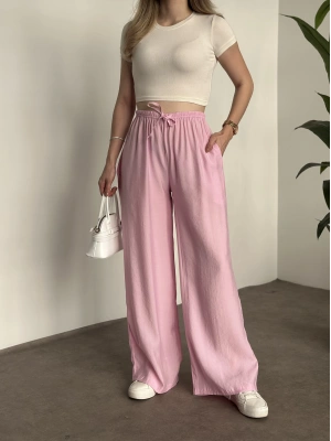 Marka etiketli tensel kumaş şalvar pantolon pembe