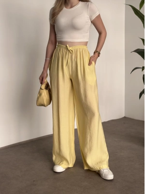 Marka etiketli tensel kumaş şalvar pantolon sarı