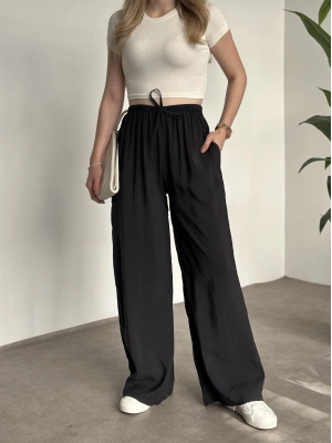 Marka etiketli tensel kumaş şalvar pantolon siyah