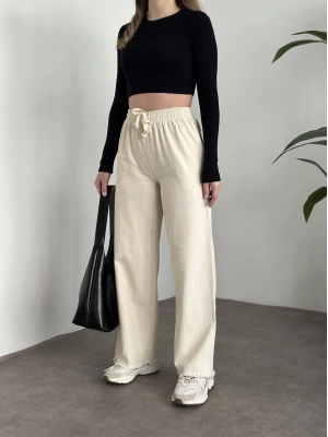 Zr marka etiketli gabardin kumaş kesik paça pantolon krem