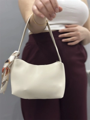 Riwan krem cilt çanta