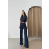 YAN BÜZGÜ DETAY BLUZ VE PANTOLONLU GOFRE İKİLİ TAKIM LACİVERT