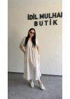 Bej Batik Desenli Dökümlü Elbise