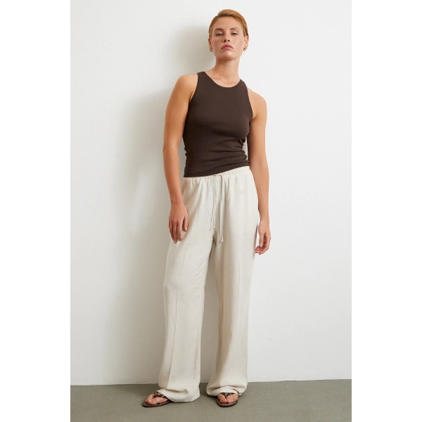 Beli Lastikli Boru Paça Pantolon Bej