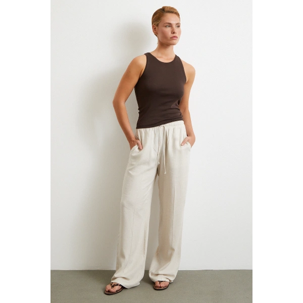 Beli Lastikli Boru Paça Pantolon Bej