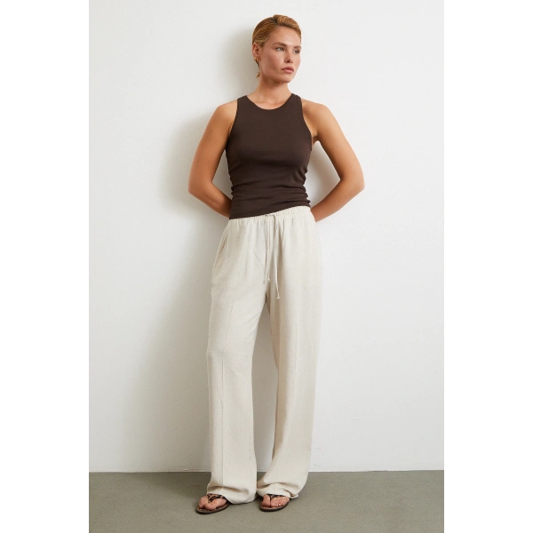 Beli Lastikli Boru Paça Pantolon Bej