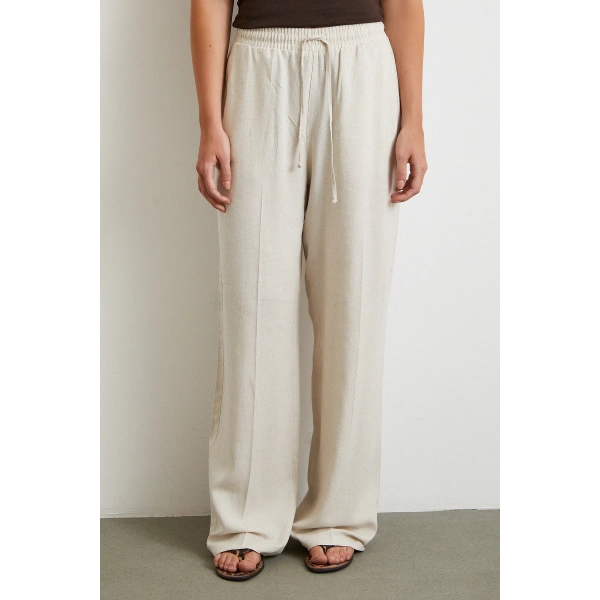 Beli Lastikli Boru Paça Pantolon Bej