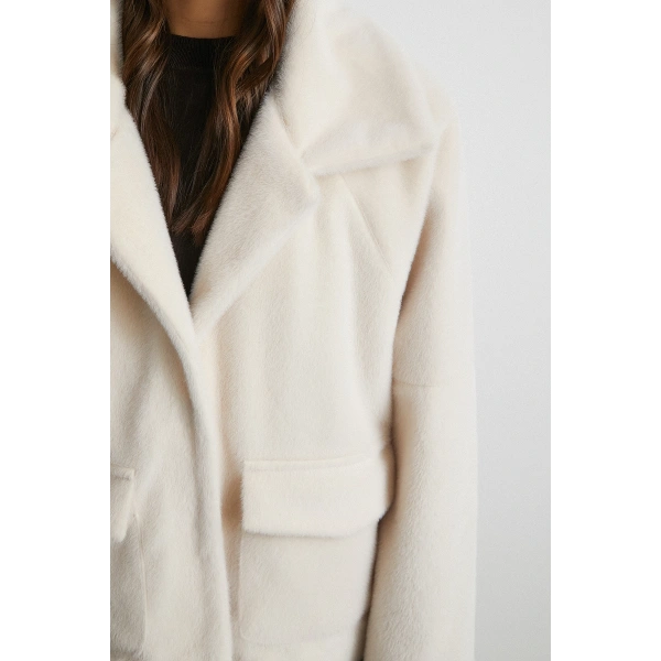 Reglan Tay Flok Mont Bej