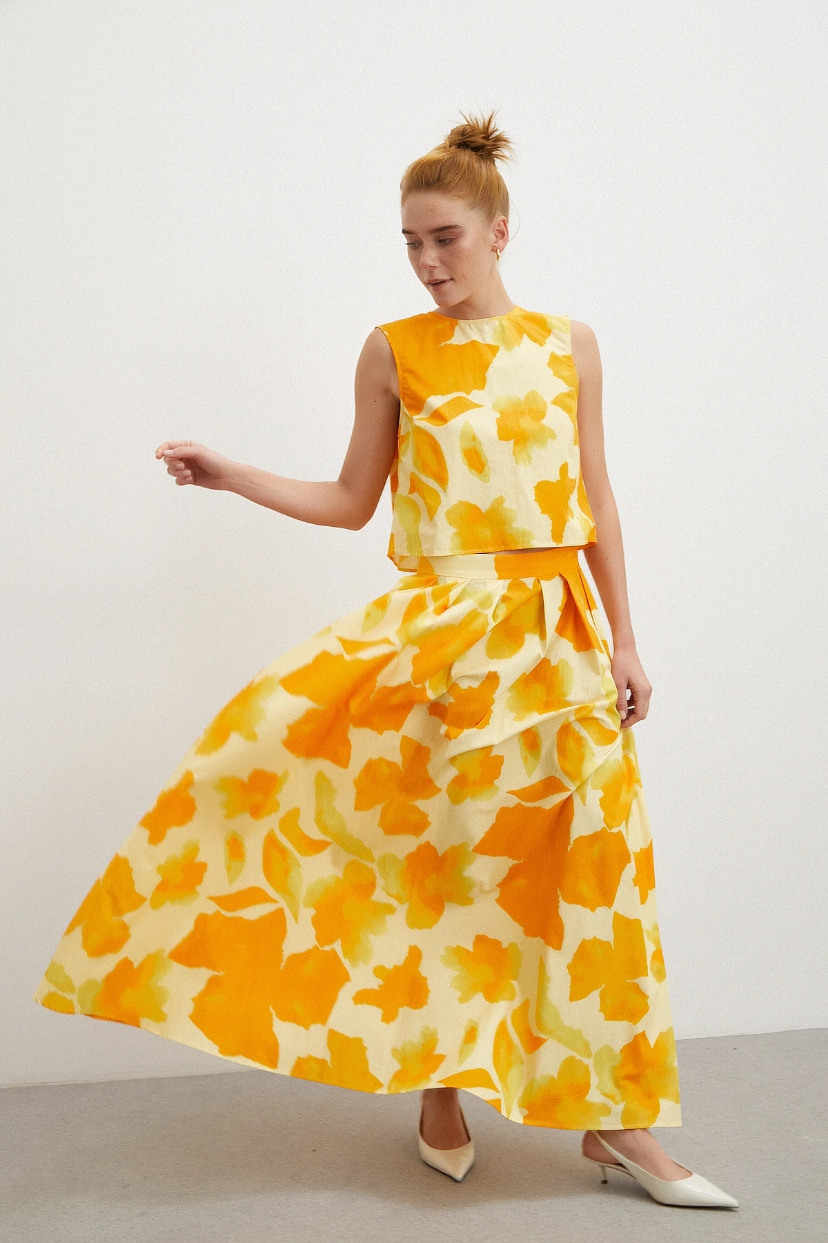 Beli Lastikli Batik Desen Piliseli Etek Sarı