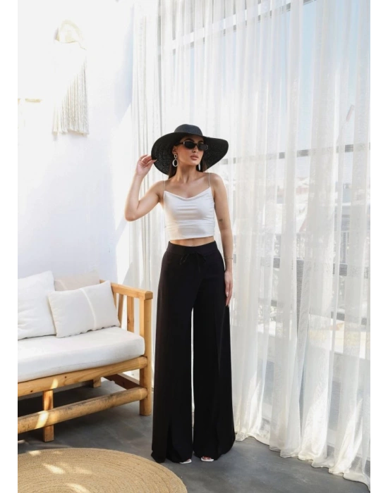 Keten Önü Çapraz Parçali Lasti̇kli̇ Ve Bağcikli Geni̇ş Paça Pantolon