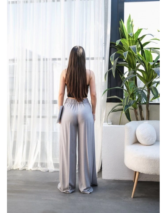 Keten Önü Çapraz Parçali Lasti̇kli̇ Ve Bağcikli Geni̇ş Paça Pantolon