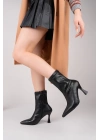kadın siyah streç deri sivri burun fermuar detaylı topuklu bot