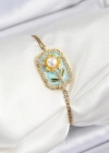 316L Çelik Zincir Turkuaz Mineli Sanatsal Portre İnci Detaylı Papatya Model Gold Renk Kadın Bileklik