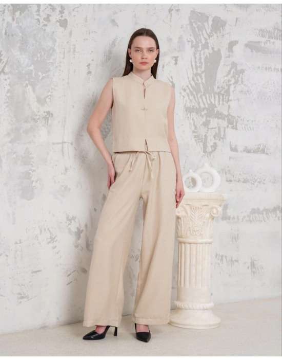 Broşlu yelek pantolon takım bej s255821