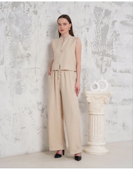 Broşlu yelek pantolon takım bej s255821