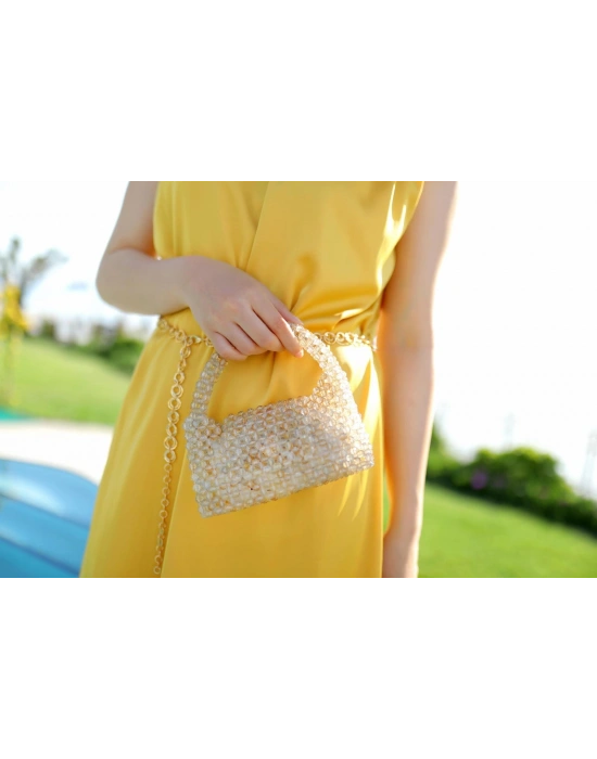 El yapımı incili el çantası kapaklı krem