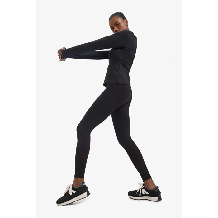 DeFactoFit Toparlayıcı Yüksek Bel İçi Yumuşak Tüylü Beli Saran Basic Düz Sporcu Tayt (25 AU)