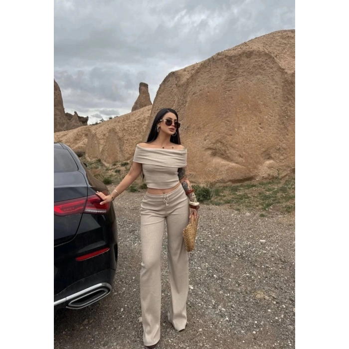 Madonna yaka bol paça pantolonlu takım