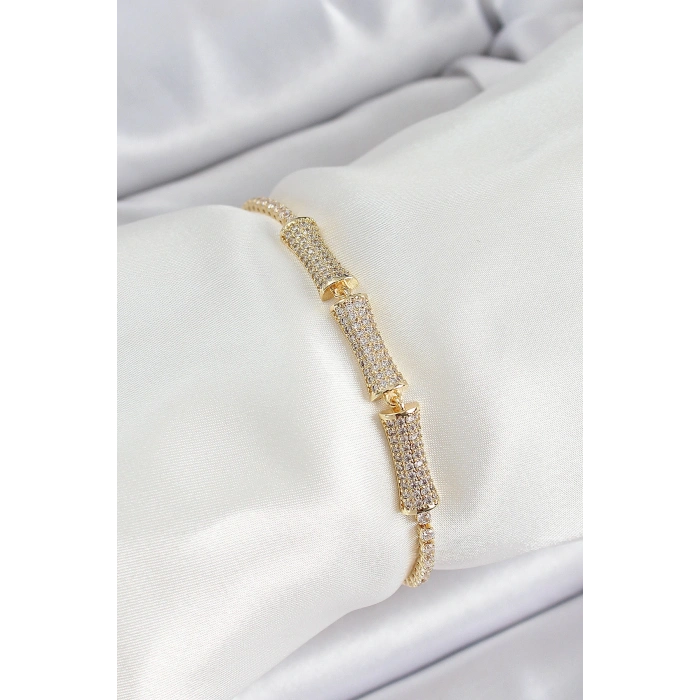Pirinç Gold Renk Zirkon Taşlı Kemik Model Kadın Bileklik