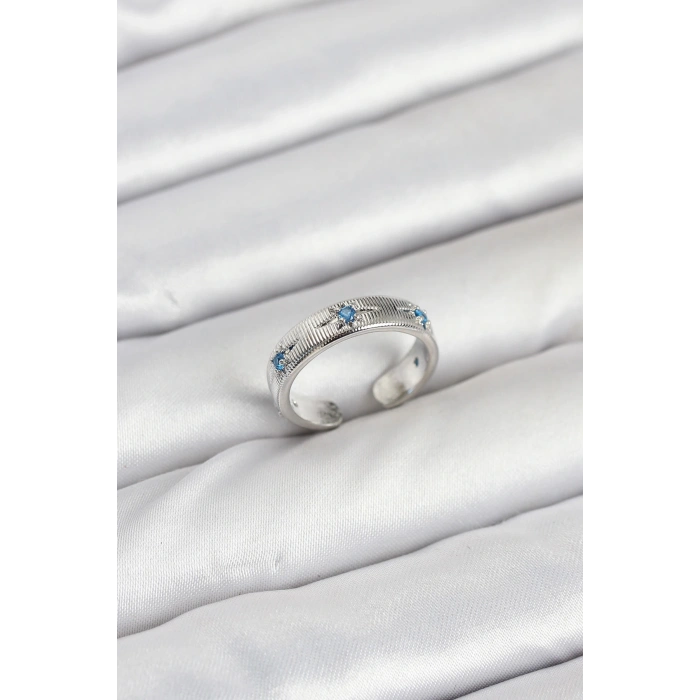 Pirinç Gümüş Renk Mavi Zirkon Taşlı Kutup Yıldızı Model Kadın Yüzük