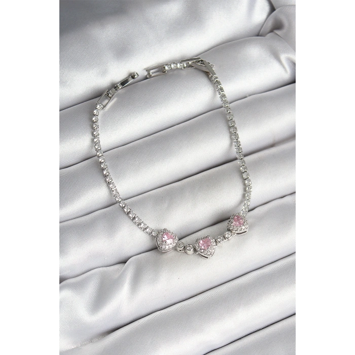 Pirinç Sıralı Pembe Kalp Figürlü Zirkon Taşlı Gümüş Renk Kadın Bileklik