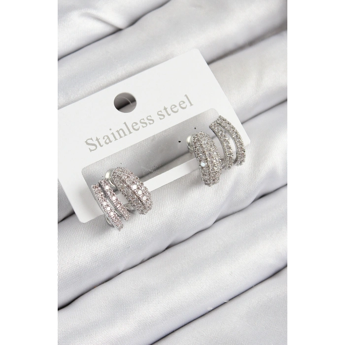 Pirinç Zirkon Taşlı Kıvrımlı Model Gümüş Renk Kadın Küpe