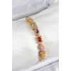 Pirinç Karışık Zirkon Taşlı Baget Model Gold Renk VIP Seri Kadın Bileklik