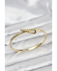 Pirinç Gold Renk Zirkon Taşlı Fiyonk Model Kadın Kelepçe Bileklik