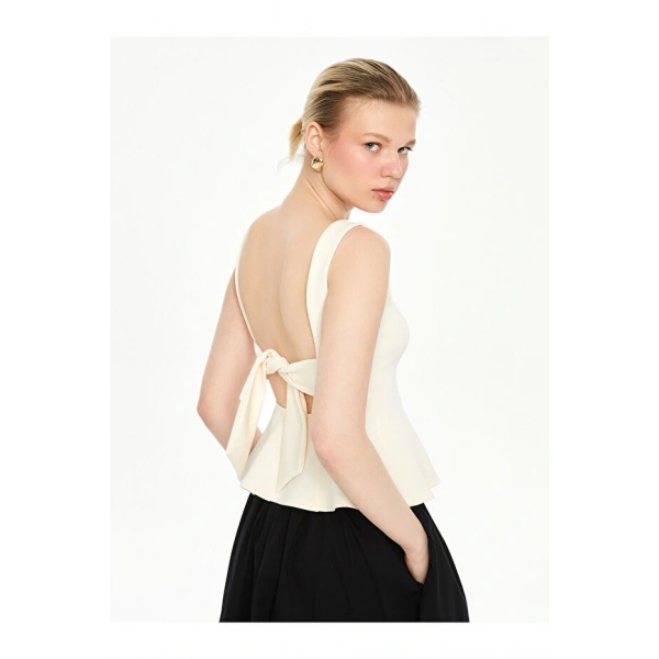 LC Waikiki Ekru Kayık Yaka Peplum Bluz