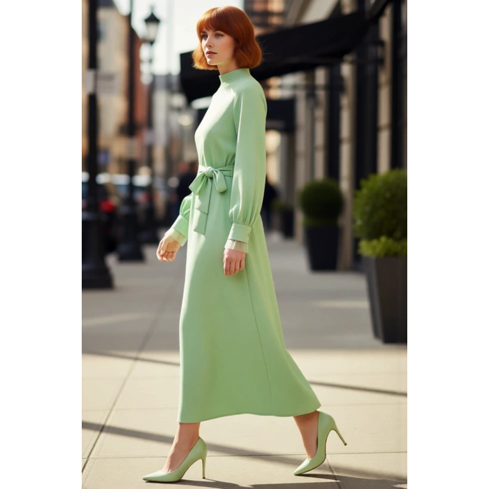 Kadın Dik Yaka Balon Kollu Kuşaklı Düz Dokuma A Kesim Maxi Elbise Rahatlığı Zarafetle Birleştiriyor