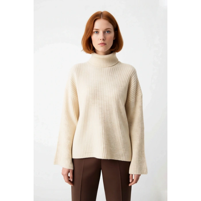 Kadın Oversize Düşük Kollu Balıkçı Yaka Triko Kazak Soğuk Havalarda Şıklık ve Konfor Sunar