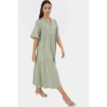 Rahat ve Şık Müslin Elbise Midi Boy Geniş Kesim %Pamuk Kullanım