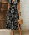 Kadın Kısa Kollu V Yakalı Desenli Yandan Yırtmaçlı Süprem Elbise